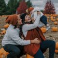 family photoshoot in pumpkin patch